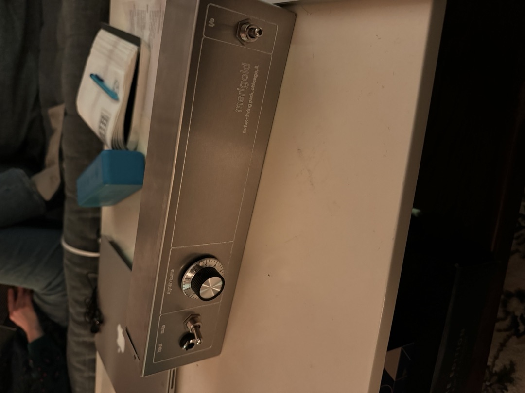 The control panel, knobs mounted and the marigold nameplate printed on