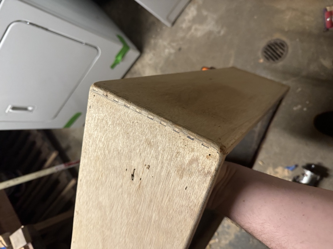 A corner of the new cabinet, plywood glued and pinned