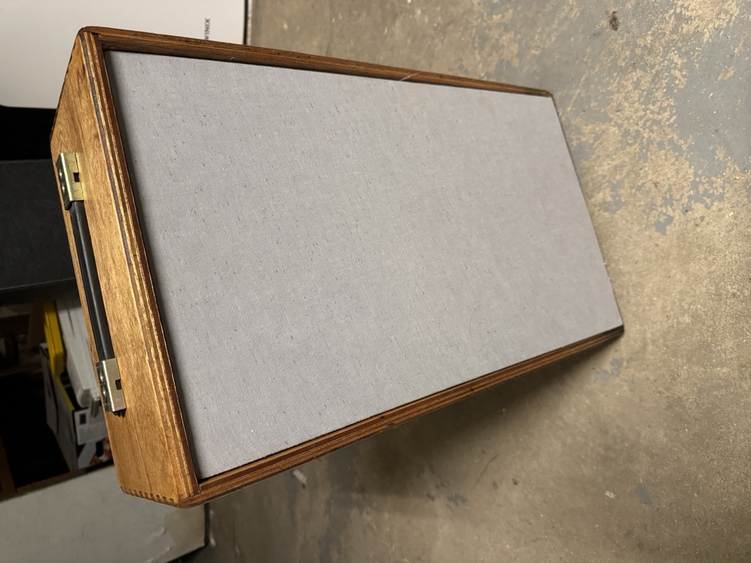 The same cabinet with its carry handle mounted